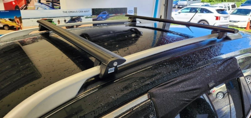 Load image into Gallery viewer, Toyota Prado with roof rails - CRUZ Clamp on Racks
