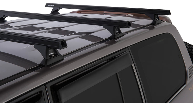 Load image into Gallery viewer, Toyota Landcruiser 100 series Rhinorack Roof Racks Heavy Duty - 3 bar
