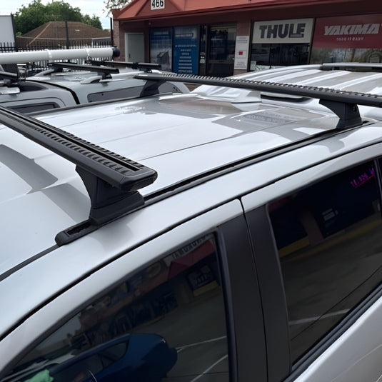 Roof Racks Ford Ranger Gen2 / Track mounted Rhinorack Sportz