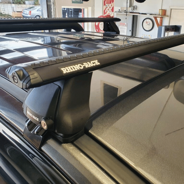 Load image into Gallery viewer, Rhino-Rack Overhang Vortex Bar Clamp on Roof Racks

