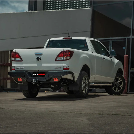White Mazda BT-50 pickup truck with Rockamor Elite Steel Rear Step Towbar