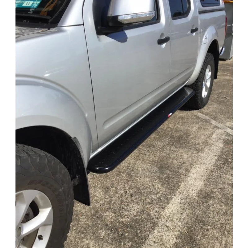 Load image into Gallery viewer, Silver pickup truck featuring black running board with Rockarmor Brushbar for Nissan Navara D40
