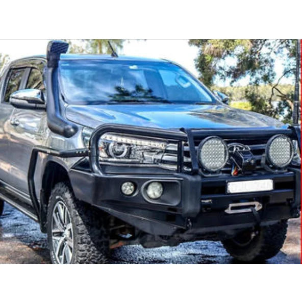 Load image into Gallery viewer, Modified gray Toyota Hilux with Rockarmor Brushbars and Rockslider accessories

