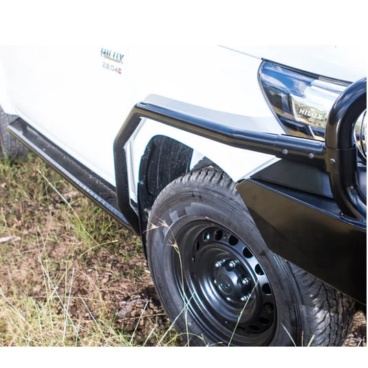 White pickup truck with black steel bumper and rockarmor brush bars for Toyota Hilux