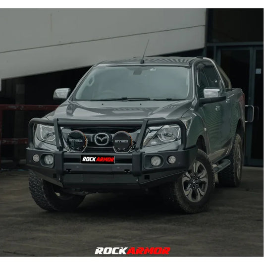 Gray Mazda BT-50 pickup truck with aftermarket steel bullbar from Rockarmor Elite Steel series