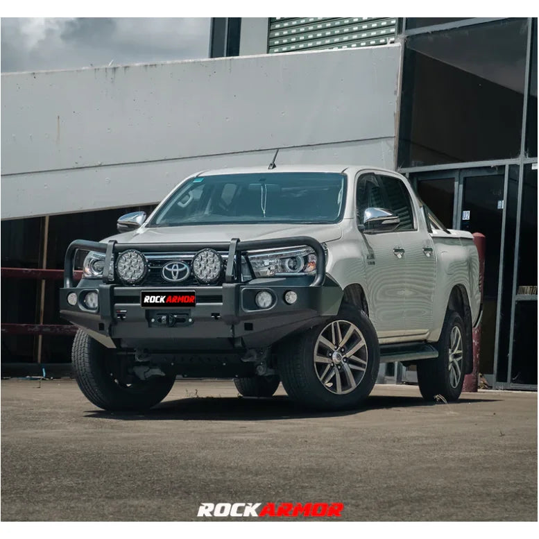 Load image into Gallery viewer, White pickup truck with aftermarket elite bull bar and fog lights on Toyota Hilux N80
