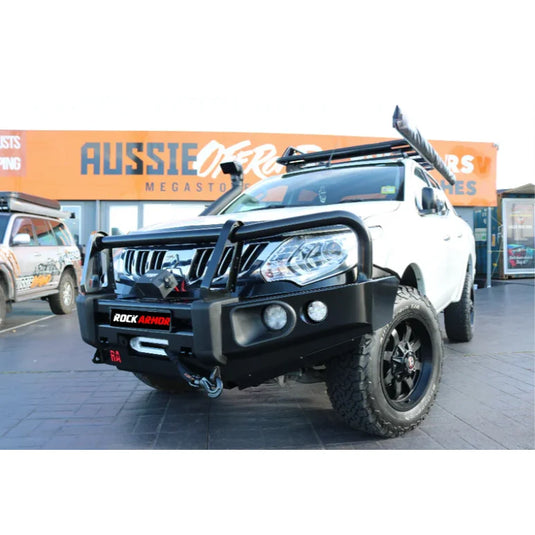 White off-road pickup truck with Rockarmor Elite Steel Bullbar and fog lights