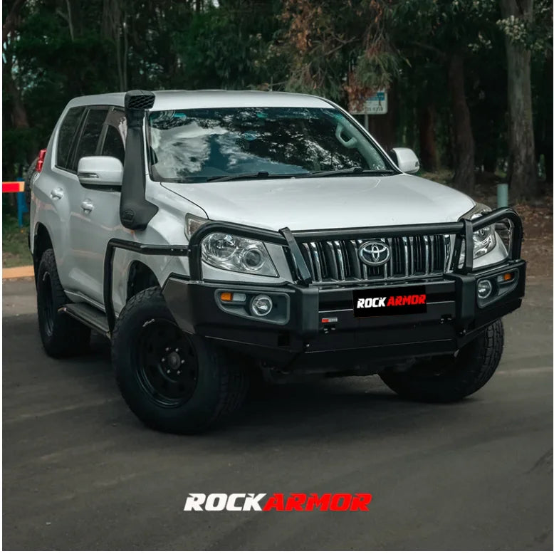 Load image into Gallery viewer, Silver off-road vehicle with black accessories featuring the Rockarmor Elite Steel Bullbar for Toyota Prado 150 2009-2013
