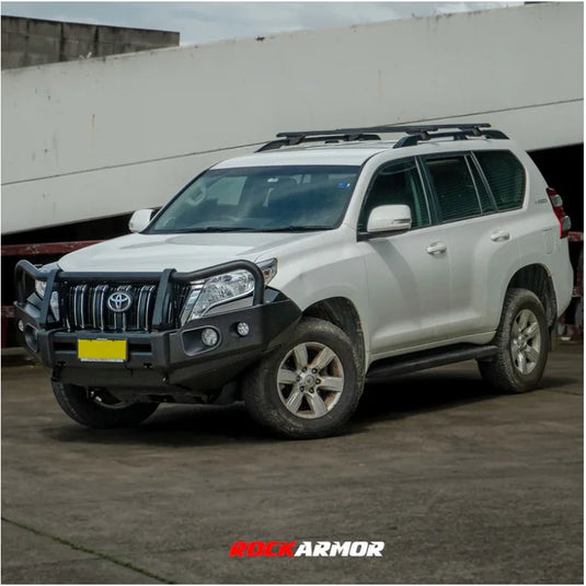 White SUV with black steel bullbar and roof rack featuring Rockarmor Elite Steel Bullbar for Toyota Prado 150