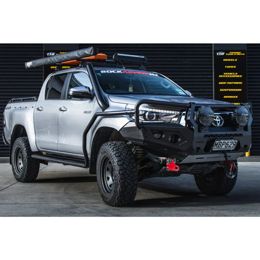 Silver off-road pickup truck with Rockarmor GT Hoop Steel Bullbar on Toyota Hilux N80