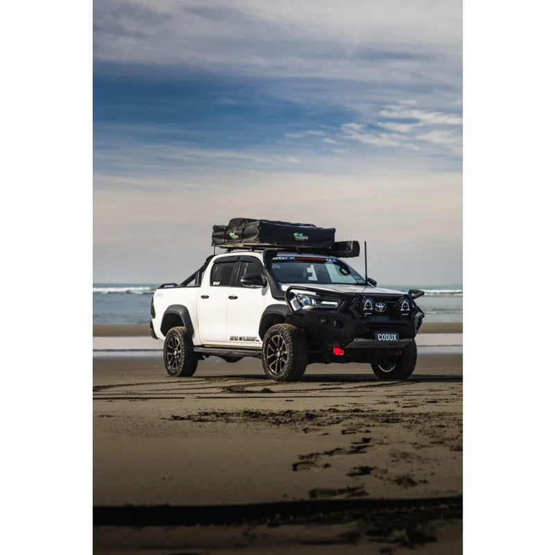 Load image into Gallery viewer, White pickup truck with roof tent showcasing Rockarmor GT Steel Hoop Bull Bar Combo Pack for Toyota Hilux 2020+
