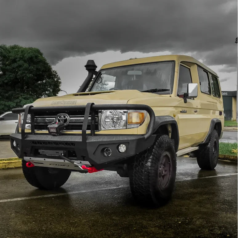 Load image into Gallery viewer, Beige Toyota Land Cruiser with aftermarket steel hoop bullbar and bumper for VDJ78 Troopy
