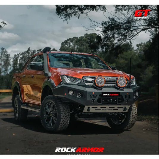 Orange pickup truck with rockarmor gt steel bull bar and driving lights installed