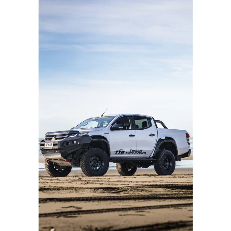 Load image into Gallery viewer, White off-road pickup truck with Rockarmor GT Steel Bull Bar and driving lights
