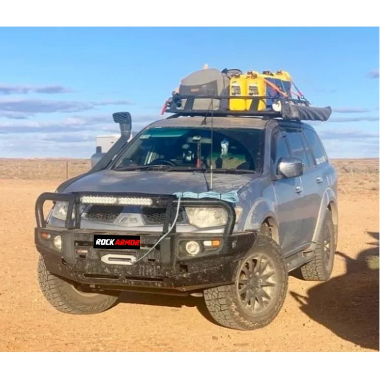 Load image into Gallery viewer, Gray SUV with roof rack featuring Steel Bullbar and Fog Lights for Mitsubishi Triton
