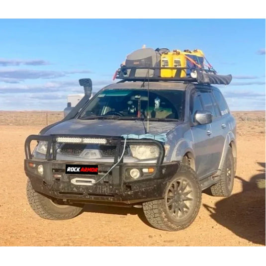 Gray SUV with roof rack featuring Steel Bullbar and Fog Lights for Mitsubishi Triton