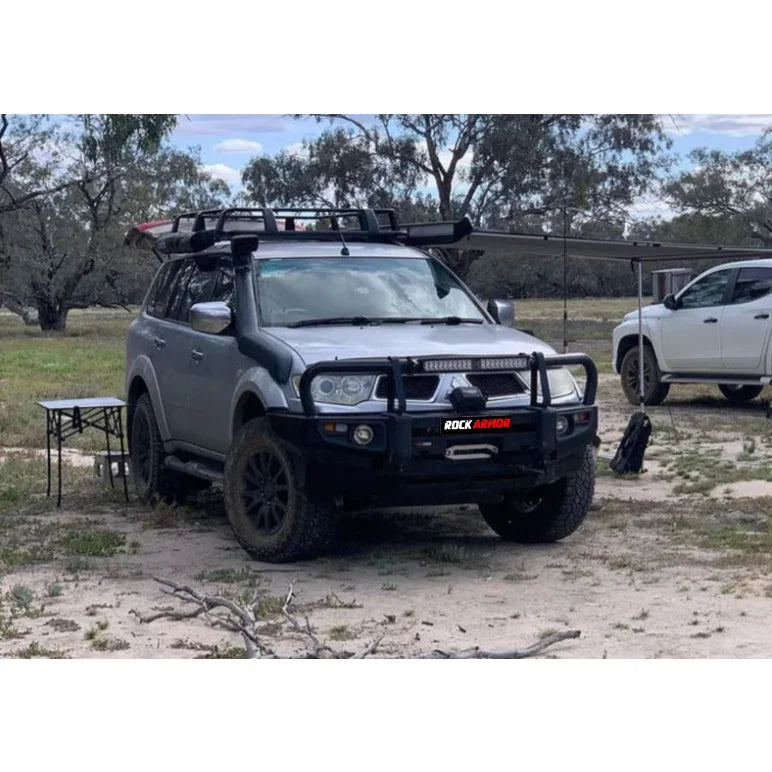 Load image into Gallery viewer, Silver SUV with steel bullbar and fog lights designed for Mitsubishi Triton Challenger 2009-2015

