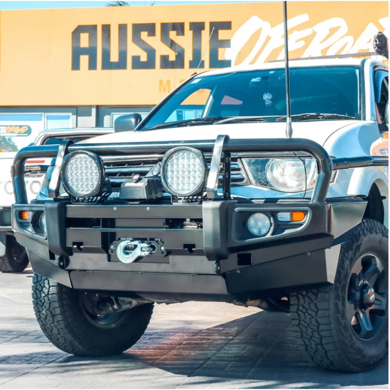 Load image into Gallery viewer, White off-road vehicle with steel bullbar and fog lights suitable for Mitsubishi Triton 2009-2015
