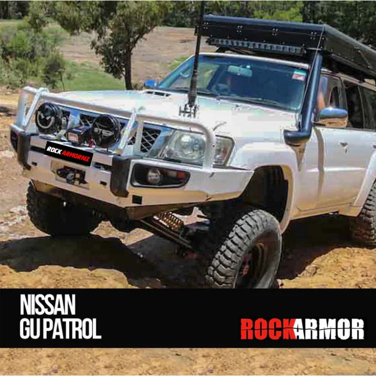 Load image into Gallery viewer, White Nissan GU Patrol off-road vehicle with Rockarmor premium steel bullbar and fog lights

