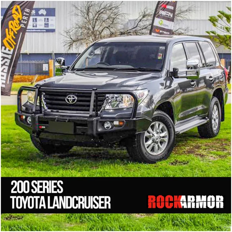 Load image into Gallery viewer, Gray Toyota Landcruiser with premium steel bull bar and fog lights for enhanced protection
