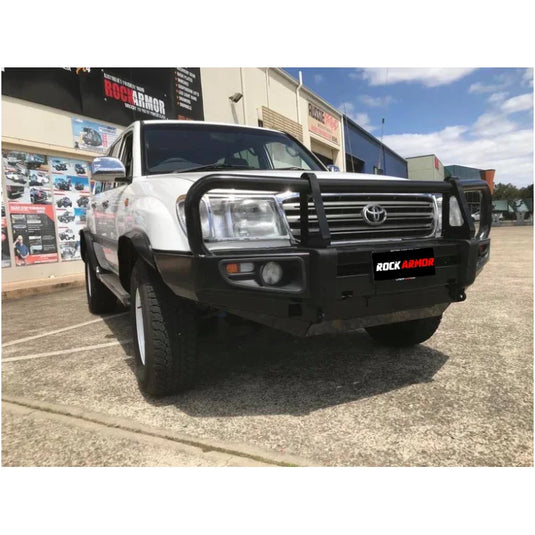 White pickup truck with black bull bar and fog lights, premium steel bullbar for Toyota Landcruiser Fj100