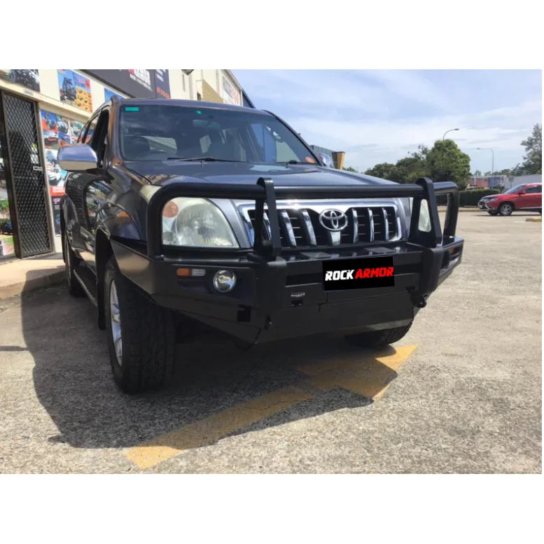 Load image into Gallery viewer, Black Toyota Prado with premium steel bull bar and fog lights for off-road protection
