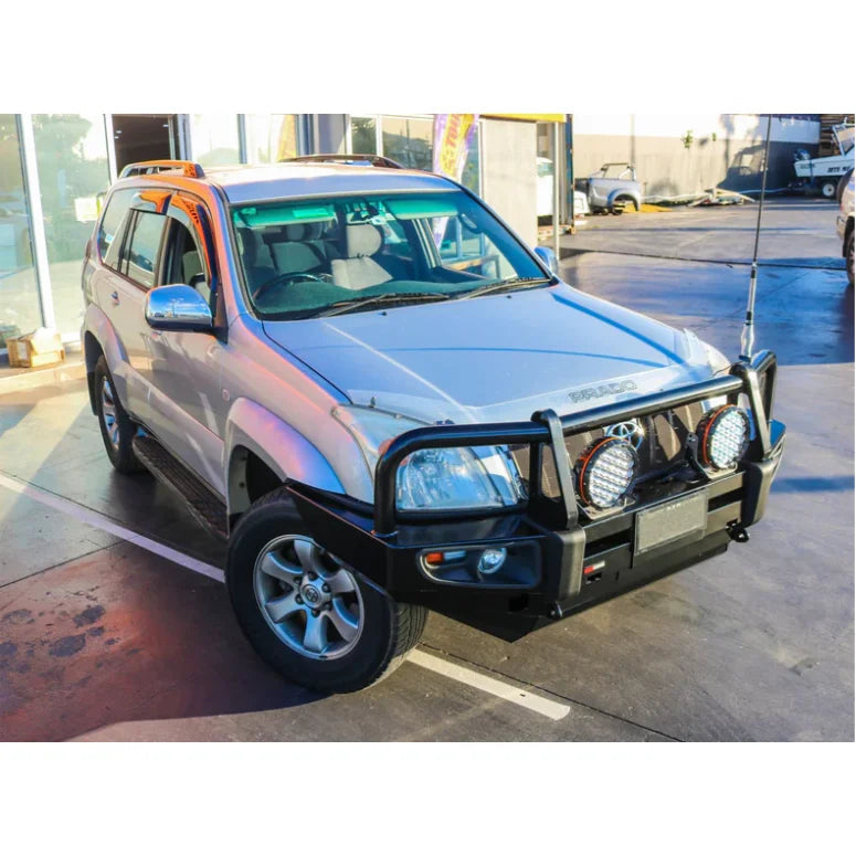 Load image into Gallery viewer, Silver SUV with Rockarmor premium steel bullbar and fog lights for Toyota Prado Fj120
