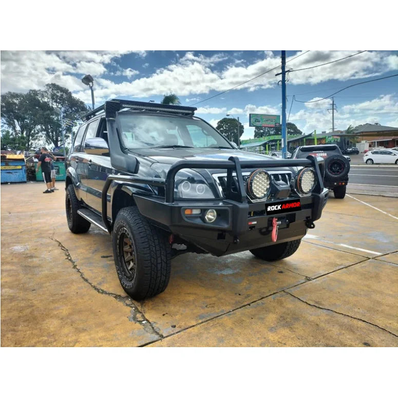 Load image into Gallery viewer, Black off-road SUV with premium steel bullbar, fog lights, and roof rack for Toyota Prado Fj120
