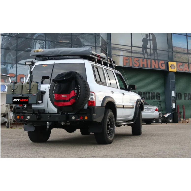 Load image into Gallery viewer, White off-road vehicle with Rockarmor Steel Dual Wheel Carrier for Nissan Patrol Y61
