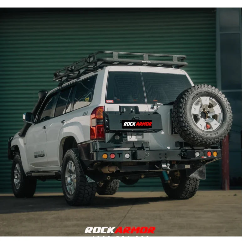 Load image into Gallery viewer, White SUV with Rockarmor Steel Dual Wheel Carrier for Nissan Patrol Y61 spare wheel
