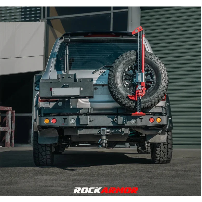 Load image into Gallery viewer, Silver SUV with rear-mounted spare wheel carrier and jack for Toyota Landcruiser Fj100 Gen III
