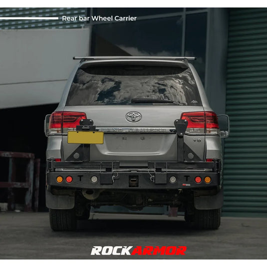 Silver SUV with rear bar wheel carrier for spare wheel on Toyota Landcruiser Fj200