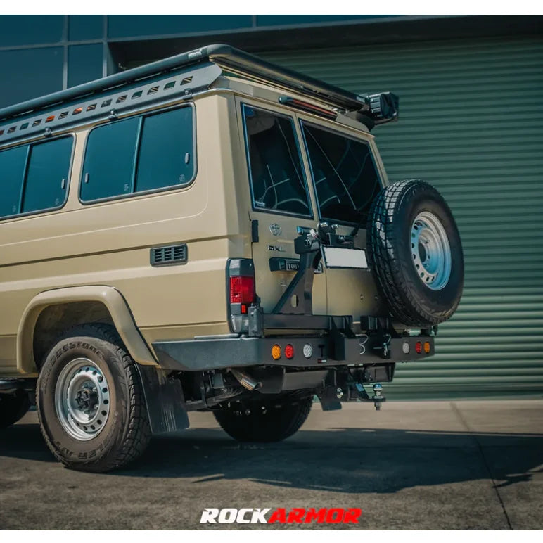 Load image into Gallery viewer, Tan off-road vehicle with Rockarmor Steel Dual Wheel Carrier for Toyota Landcruiser Fj75 Fj76 Fj78 spare wheel
