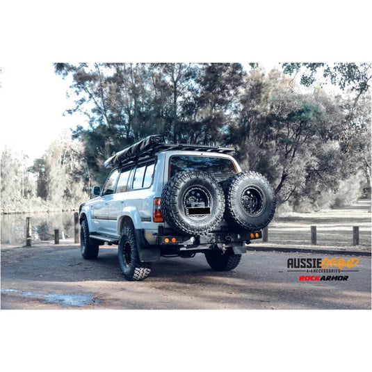 Off-road vehicle with Rockarmor Steel Dual Wheel Carrier and dual spare wheels for Toyota Landcruiser Fj80 1992-1997 with fitting video