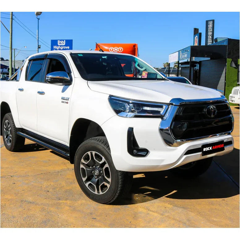 Load image into Gallery viewer, White Toyota Hilux pickup truck with Steel Checker Plate Rockarmor side steps and fitting video
