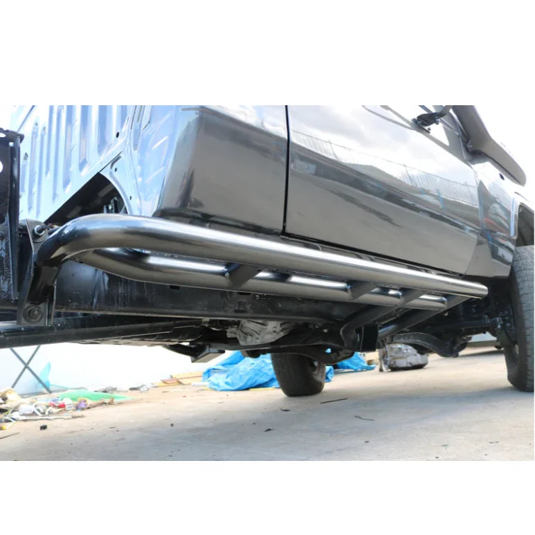 Load image into Gallery viewer, Black steel checker plate Rockarmor side steps for Toyota Landcruiser 76/79 Series
