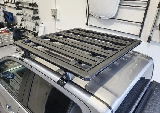 Nissan D40 - CRUZ Roof Racks & ROLA tray